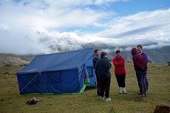 
As I drank my tea the next morning, I heard Shane cursing profusely. “Those bastards, they stole my hiking boots, my Gore-Tex jacket, and even my Tibetan phrase book.” She was fuming, and quite rightly so. “I left them in the vestibule of my tent which was zipped up. I can’t believe it. I can’t believe it”. Tashi walked over and Shane went through what was stolen. Kumar and Tashi then walked to the other tents to see if anything else was stolen. Gerhardt and Valerie weren’t so lucky; he lost his Gore-Tex jacket while she had her hiking boots stolen. Kumar walked back to Shane and Valerie and told them it probably was the local villagers, and that nothing could be done. He asked them if we needed to go back to Kharta to try and find new shoes, but luckily both Shane and Valerie had running shoes.
